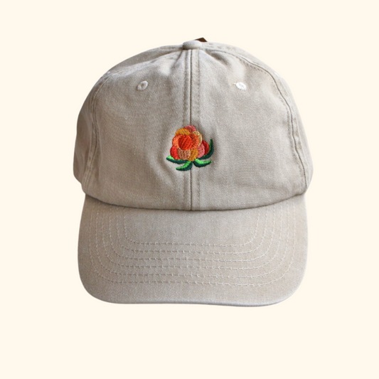 Beige vintage caps i bomull med brodert multemotiv fra Holloi